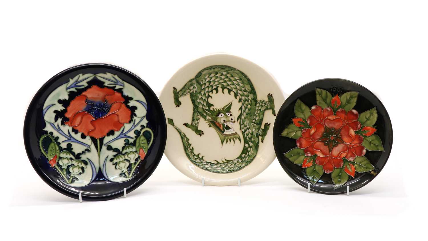 Lot 93 - A Moorcroft pottery ‘Dragon’ pattern plate