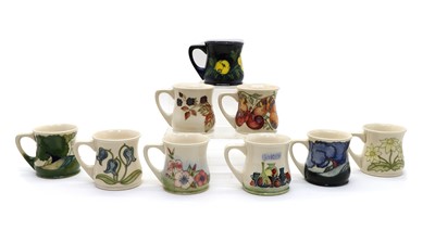 Lot 92 - A collection of Moorcroft pottery mugs