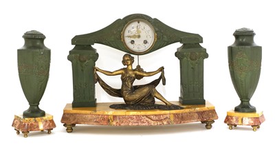 Lot 116 - An Art Deco spelter and marble mantel clock garniture