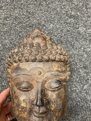 Lot 166 - A Chinese Iron Buddha head