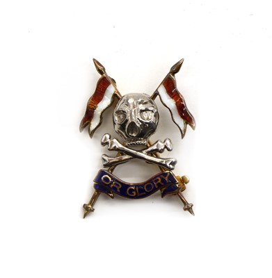 Lot 64 - A Royal Lancers 9ct gold and enamel sweetheart brooch