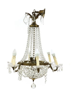 Lot 346 - A Louis XVI style brass and cut glass chandelier