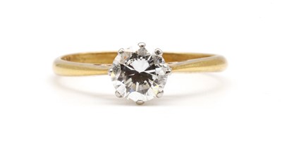 Lot 63 - A gold single stone diamond ring