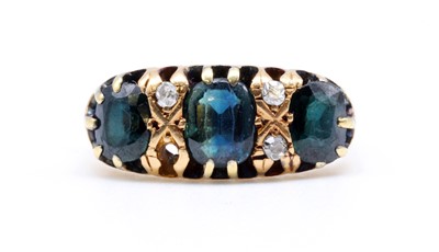 Lot 25 - An 18ct gold sapphire and diamond ring