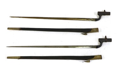 Lot 71 - Two Martini Henry Bayonets with brass mounted scabbards
