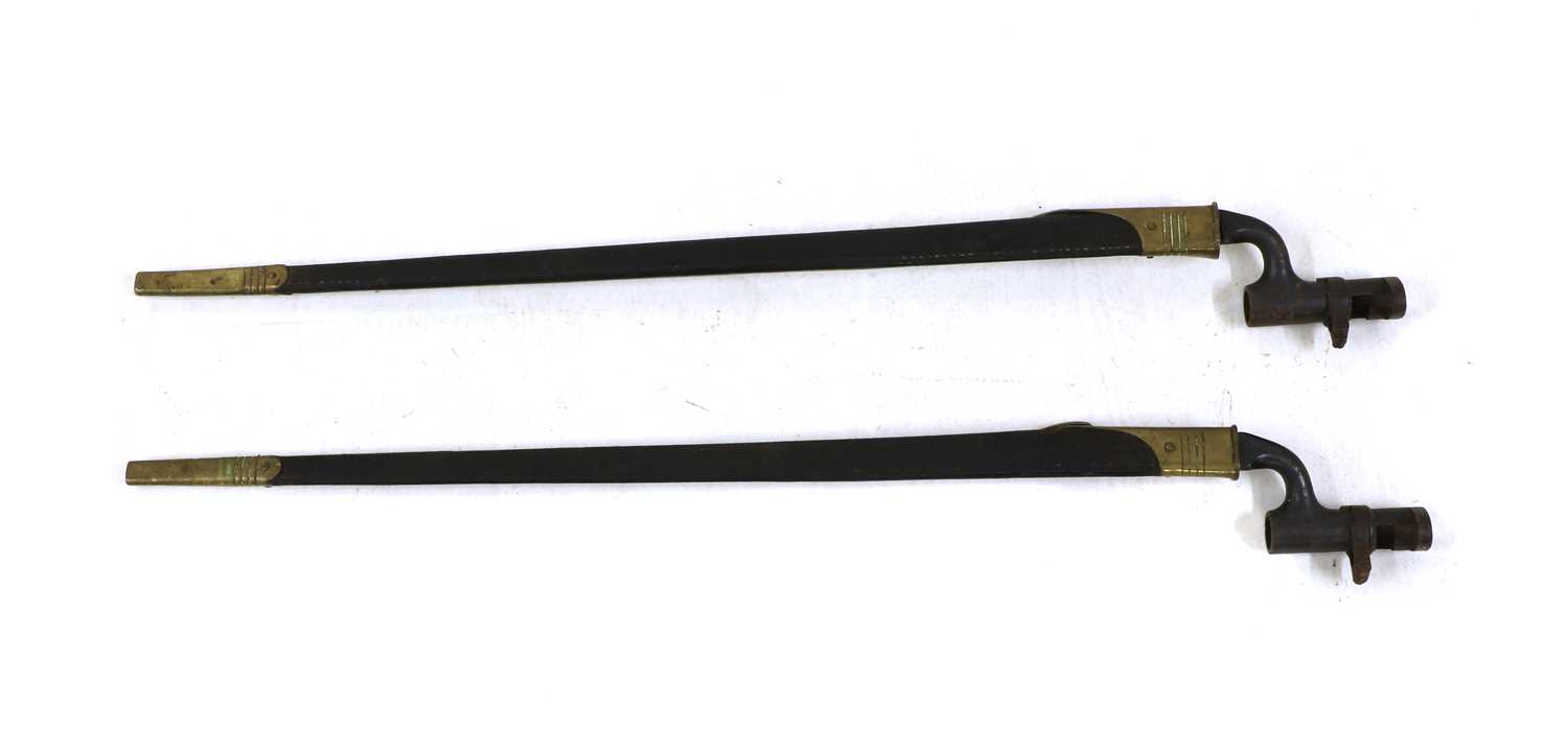 Lot 71 - Two Martini Henry Bayonets with brass mounted scabbards