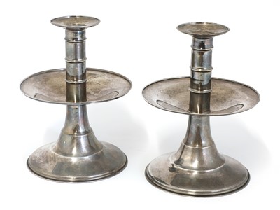 Lot 66 - A pair of silver candlesticks
