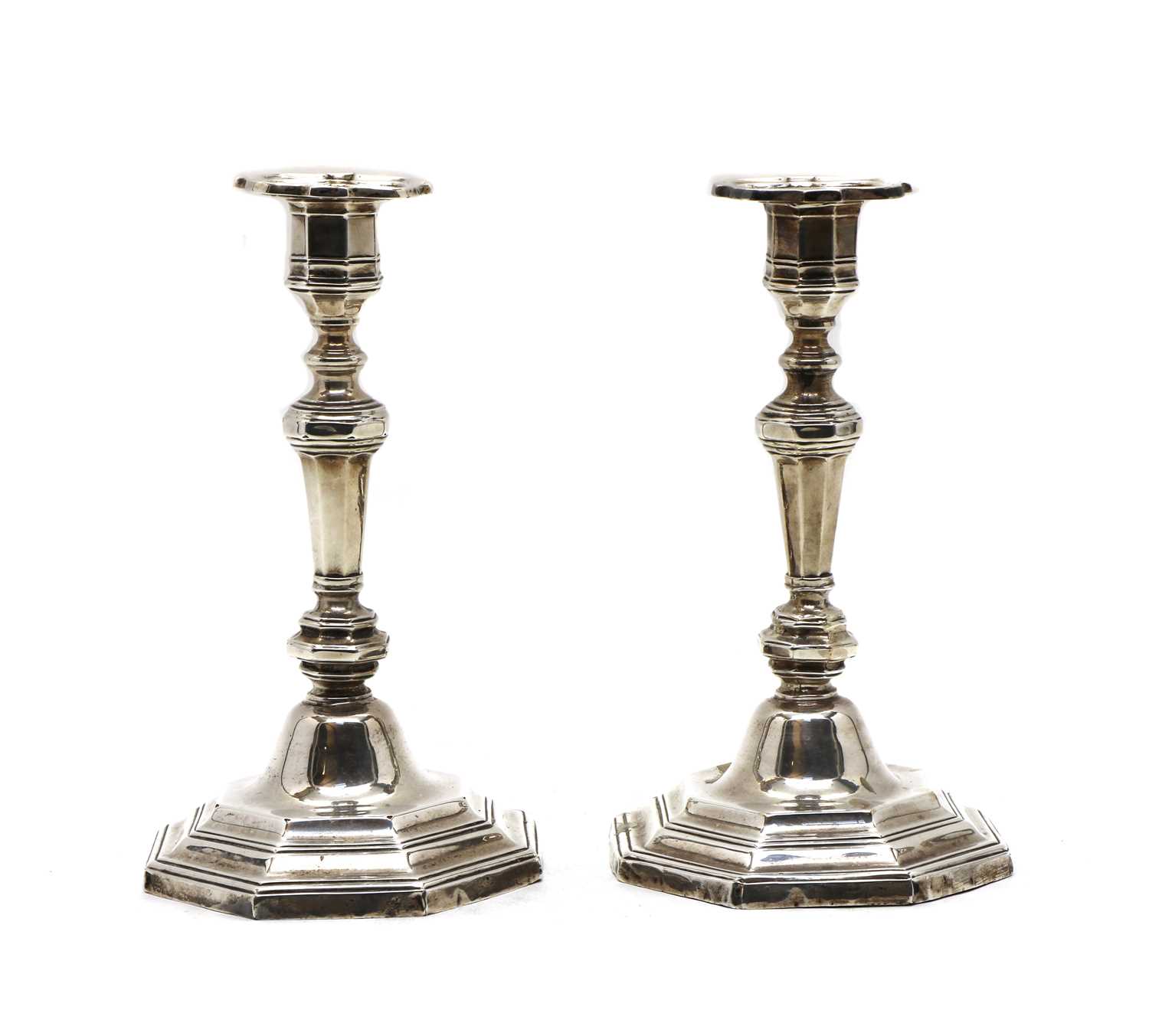 Lot 5 - A pair of 1930s silver candlesticks