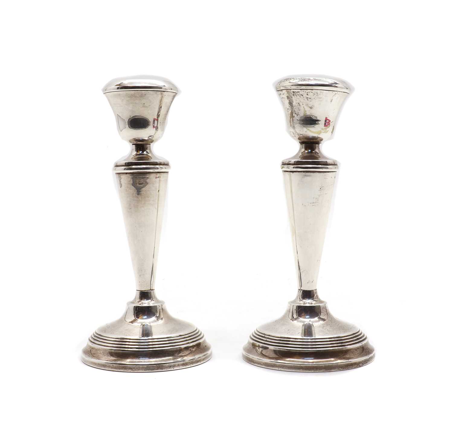 Lot 12 - A pair of Elizabeth II silver candlesticks