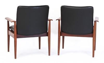 Lot 341 - A pair of 'Model 209' rosewood Diplomat chairs