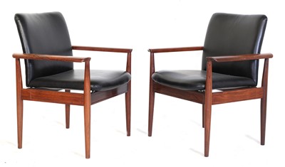 Lot 195 - A pair of 'Model 209' rosewood Diplomat chairs
