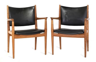 Lot 217 - A pair of 'JH713' oak lounge chairs