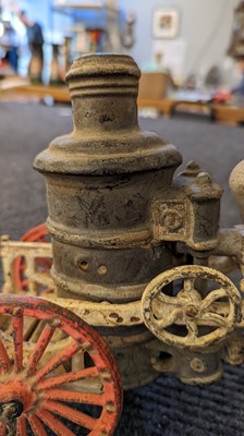 Lot 185 - An American cast iron Horse Drawn Fire Pump toy