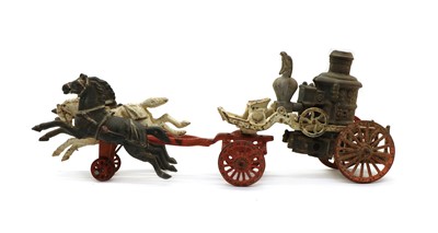 Lot 185 - An American cast iron Horse Drawn Fire Pump toy