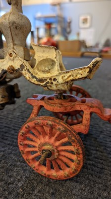 Lot 185 - An American cast iron Horse Drawn Fire Pump toy