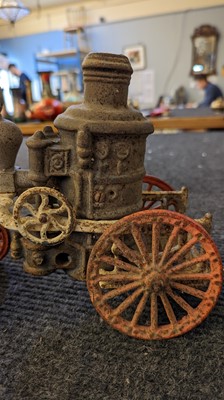 Lot 185 - An American cast iron Horse Drawn Fire Pump toy