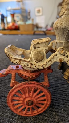 Lot 185 - An American cast iron Horse Drawn Fire Pump toy