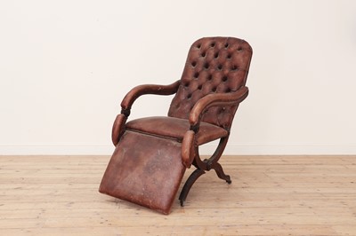 Lot 256 - A mahogany framed leather adjustable armchair