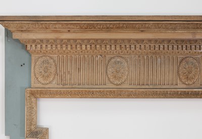 Lot 420 - A George III-style carved pine fire surround