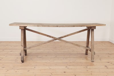 Lot 451 - A pine and oak tavern table