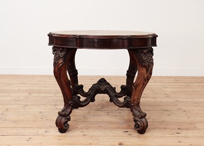 Lot 244 - A carved rosewood centre table