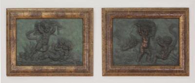 Lot 510 - A pair of faux bronze relief panels