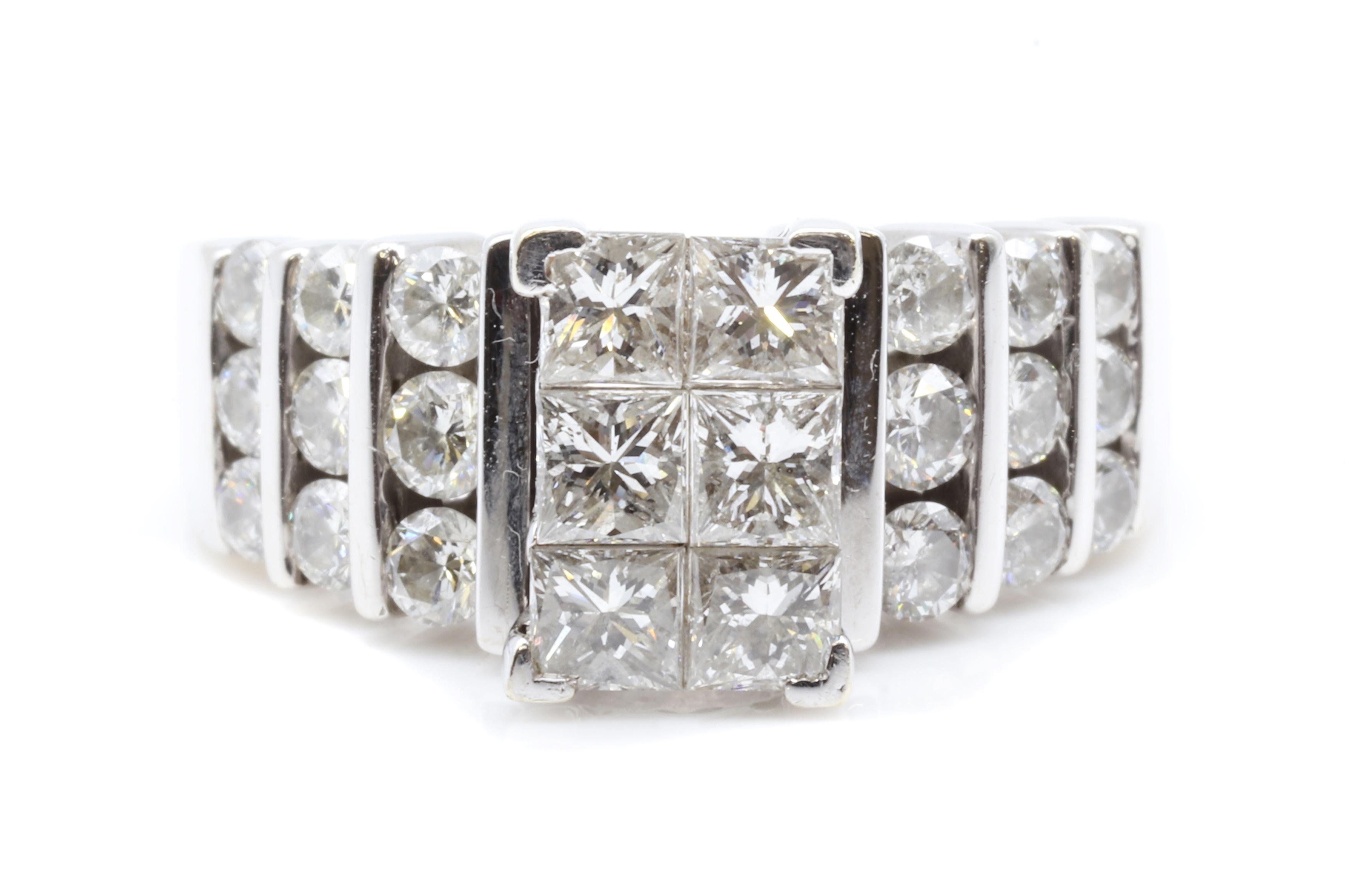 Lot 155 An American diamond set ring,