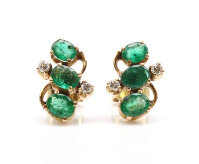 Lot 474 - A pair of emerald and diamond earrings