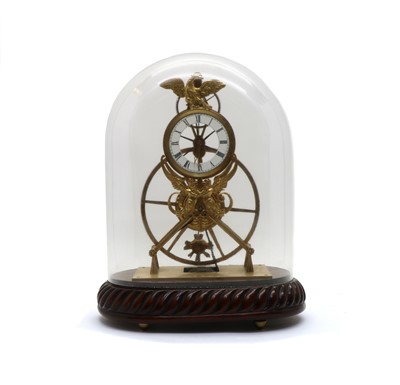 Lot 295 - An Empire-style brass skeleton clock