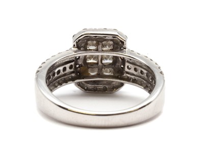 Lot 116 - A white gold princess cut diamond cluster ring