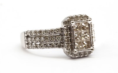 Lot 116 - A white gold princess cut diamond cluster ring