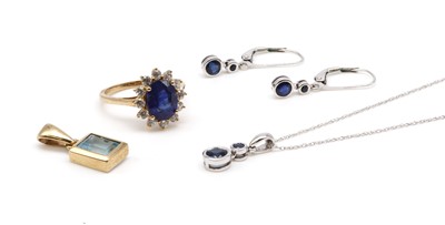 Lot 184 - A white gold sapphire pendant and earrings suite