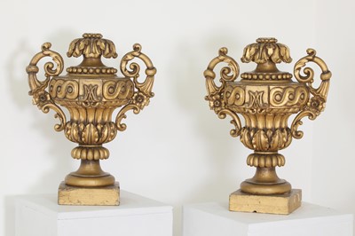 Lot 138 - A pair of carved and painted softwood urns