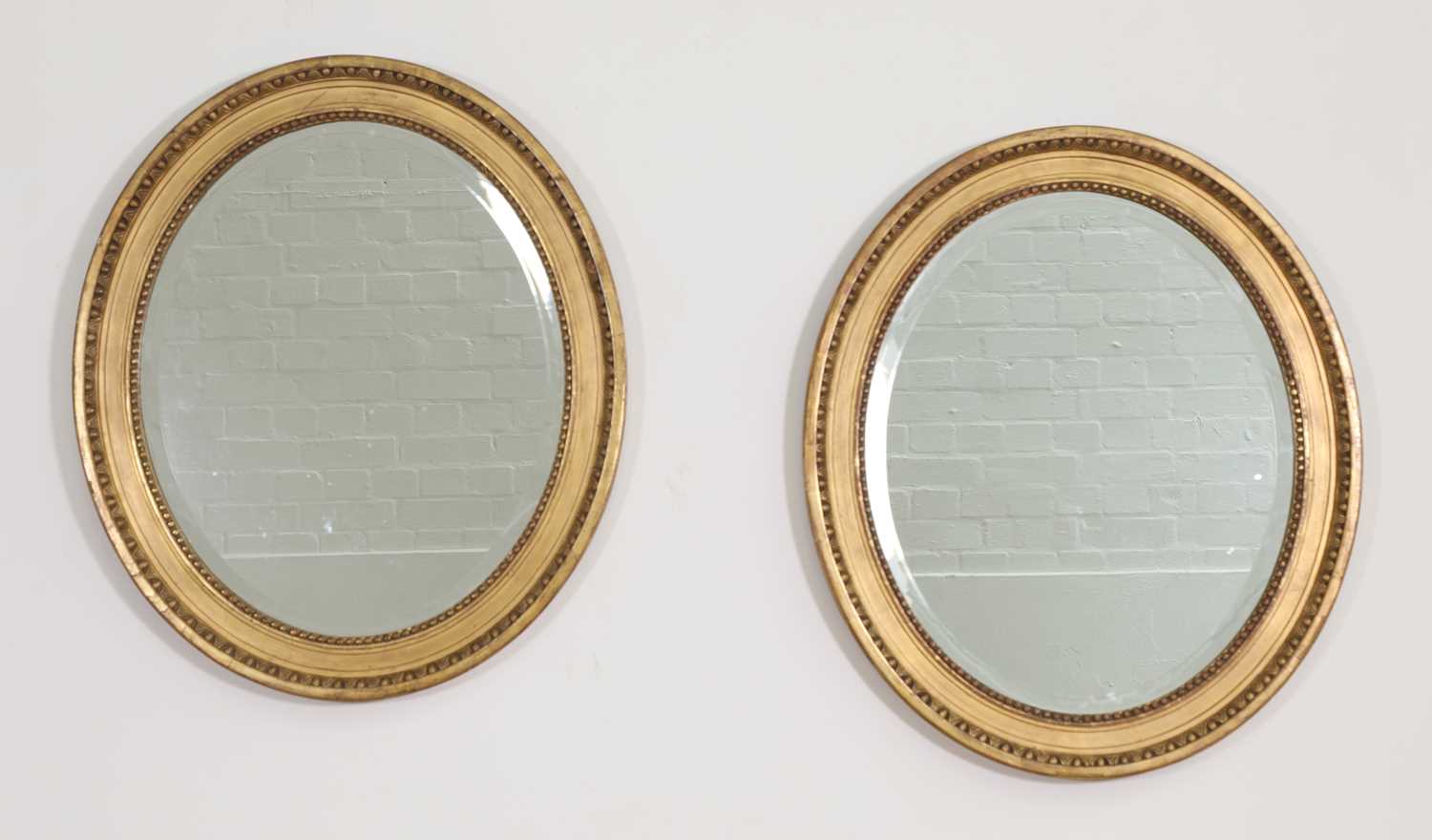 Lot 248 - A pair of oval giltwood frames