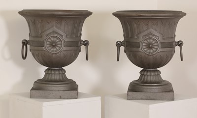 Lot 83 - A pair of Napoleon III cast iron urns
