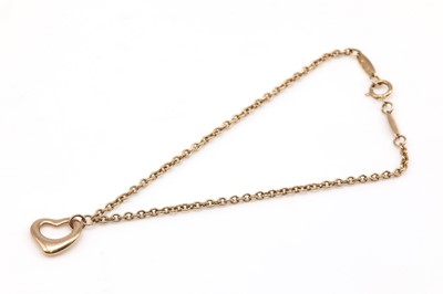 Lot 513 - A rose gold open heart bracelet, by Elsa Peretti for Tiffany & Co.