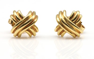 Lot 523 - A pair of gold 'criss cross' earrings, by Tiffany & Co.