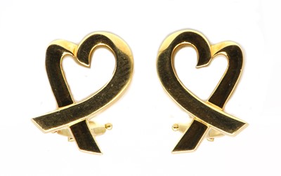 Lot 517 - A pair of gold 'Loving Heart' clip on earrings, by Paloma Picasso for Tiffany & Co.