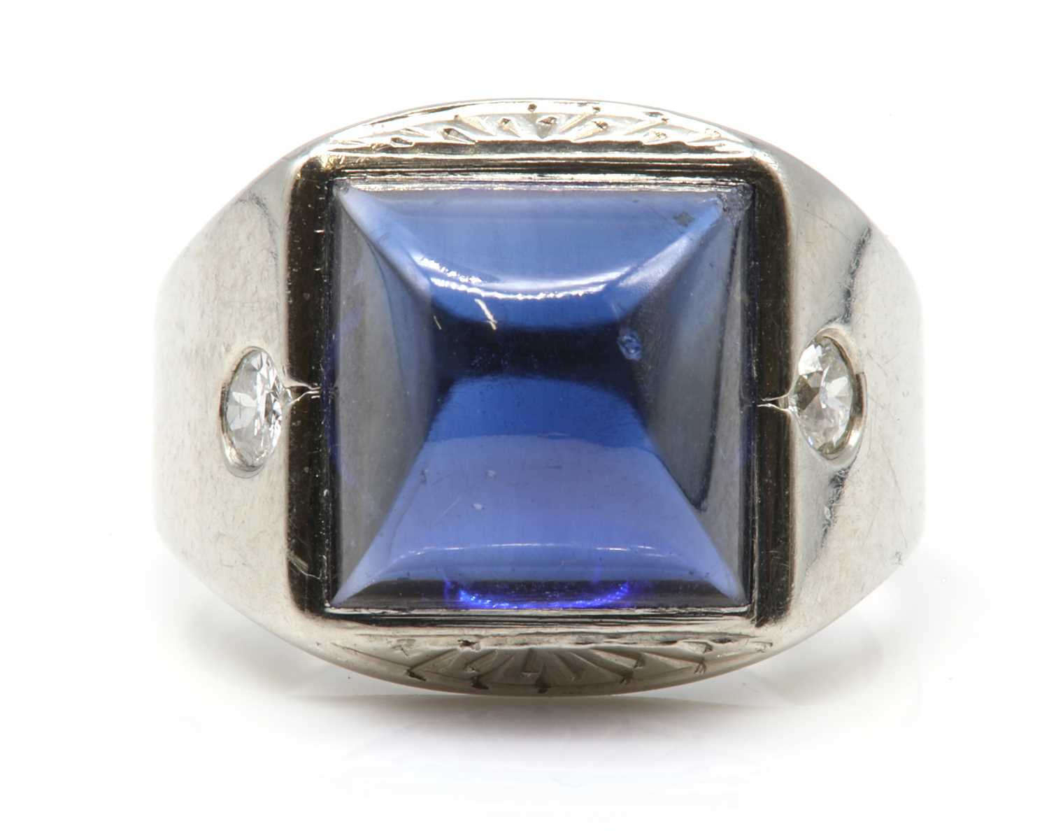 Lot 214 - An American Art Deco synthetic sapphire and diamond ring, c.1930