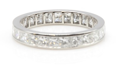Lot 383 - A diamond set full eternity ring