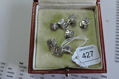 Lot 427 - A diamond set cufflink and dress stud set