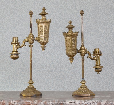 Lot 141 - A pair of Louis Philippe pressed brass Argand Student lamps