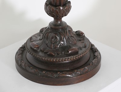 Lot 86 - A pair of Edwardian carved mahogany table lamps