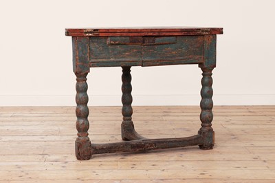 Lot 276 - A painted softwood demilune fold-over table