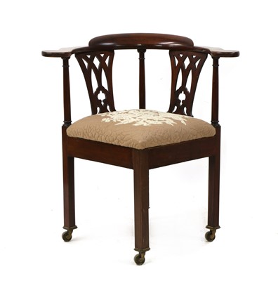 Lot 416 - A George III mahogany corner chair