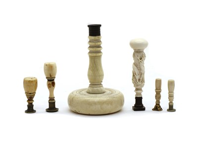 Lot 255 - A collection of six ivory and bone seals