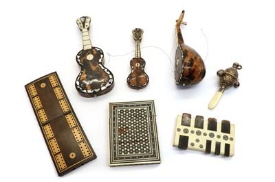 Lot 243 - A group of three Victorian tortoiseshell novelty instruments