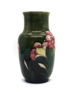 Lot 192 - A Walter Moorcroft pottery ‘African Lily’ pattern vase