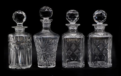 Lot 135 - A group of four crystal glass decanters