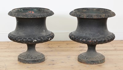 Lot 195 - A pair of cast iron garden urns